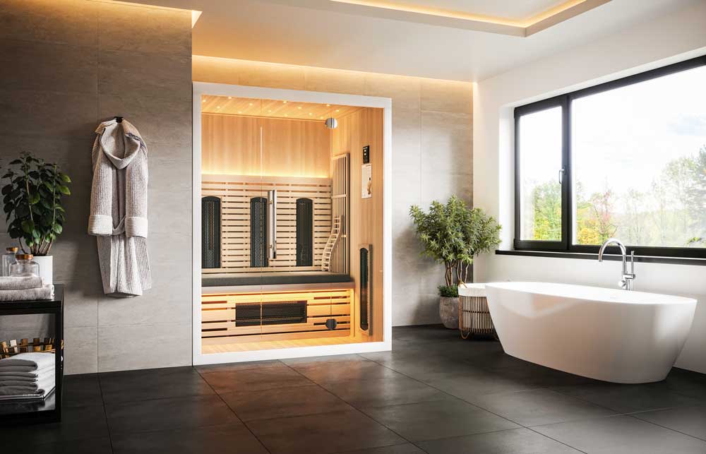 Infraroodsauna 165 Valero Pro – strak design, ruime cabine en therapeutische infraroodtechnologie. Moderne 4-persoons infraroodsauna 165 Valero Pro met glazen voorzijde en witte matte afwerking (RAL 9003), voorzien van 9 Infraheat™ stralers.